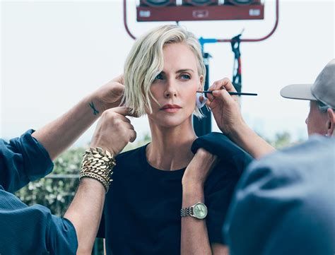 Charlize Theron watches